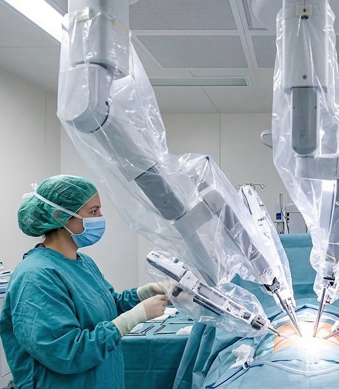 Surgeon performing robotic surgery with the Da Vinci system in an operating theatre in Barcelona